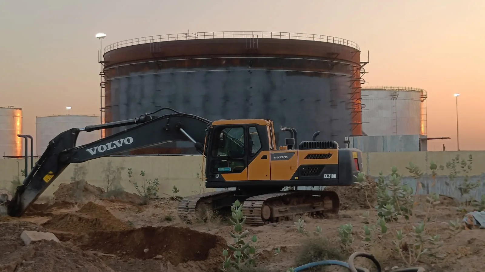 Industrial infrastructure project with excavator